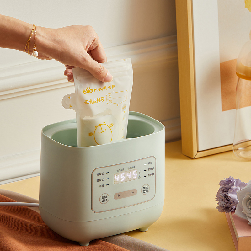 តើអ្នកមានកម្តៅដបមានសុវត្ថិភាពសម្រាប់ទឹកដោះម្តាយនិងរូបមន្តទេ?